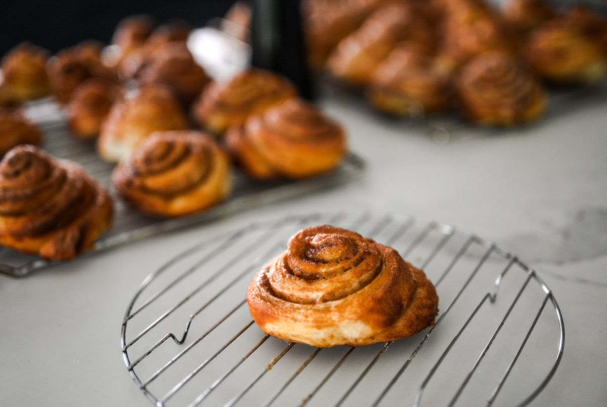 Finnish buns cooling on a wire rack